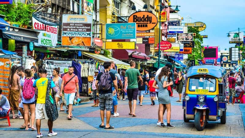 BANGKOK - July 25,2018: Locals and tourists walking along the busy streets of Khao San Road, Thailand. Khao San Road is a famous low budget hotels and guesthouses area in Bangkok