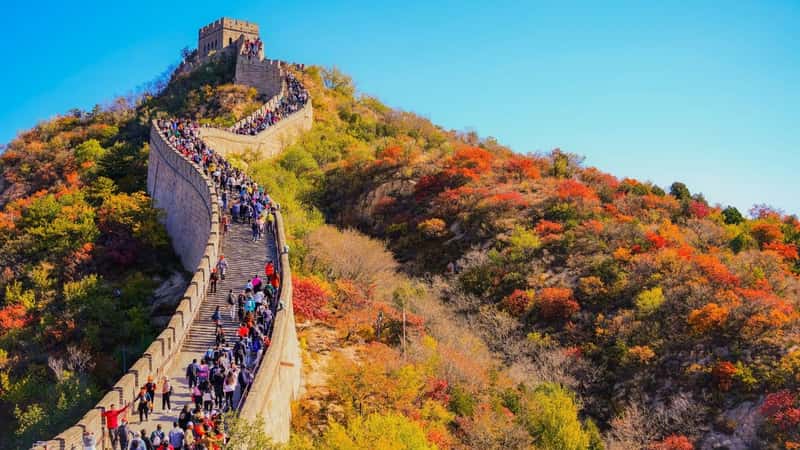Badaling, China- October 17, 2020: View of the Great Wall in Badaling with lots of visitors on a sunny day in Autumn on October 17, 2020.