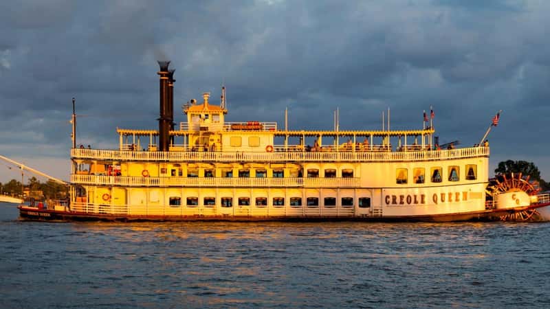 APRIL 24, 2019, NEW ORLEANS, LA, USA - Natchez Riverboat on Mississippi River in New Orleans, Louisiana at sunset