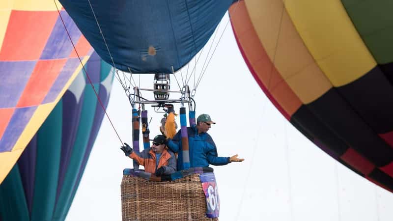 ALBUQUERQUE, NEW MEXICO - OCTOBER 6, 2015: Balloons fly over Albuquerque, New Mexico. International balloon fiesta is the biggest hot air balloon event in the world.