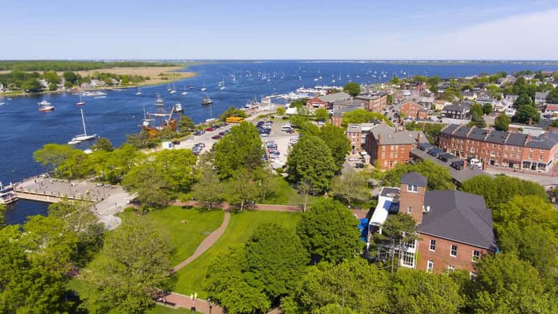 Newburyport historic downtown including Merrimack Street and Waterfront Promenade Park with Merrimack River at the background aerial view, Newburyport, Massachusetts, MA, USA.