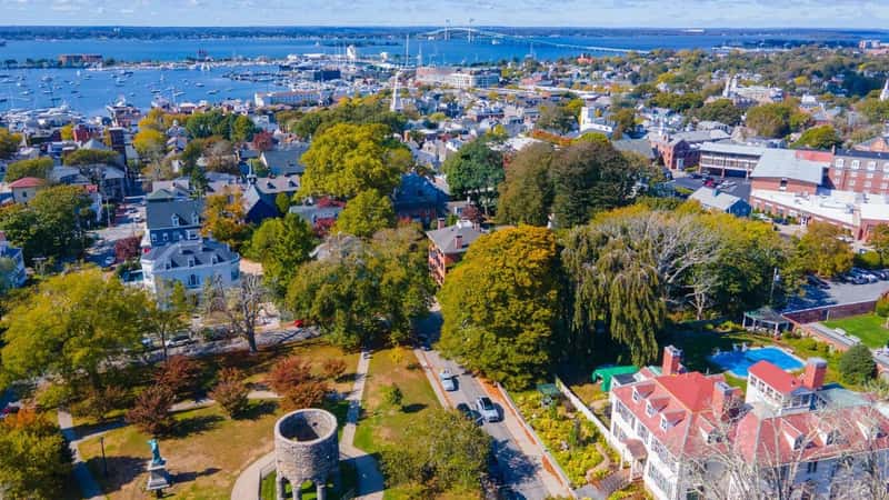 Touro Park aerial view including Windmill Tower with Newport Harbor at the background, city center of Newport, Rhode Island RI, USA.