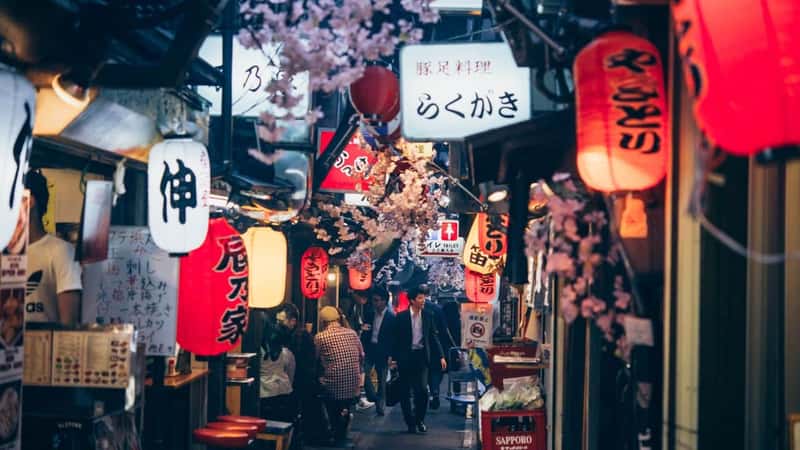 TOKYO, JAPAN - 20 APRIL, 2018: View of Omoide Yokocho more known as "Piss Alley" - famous drinking and eating quarter in Shinjuku district in Tokyo, Japan.