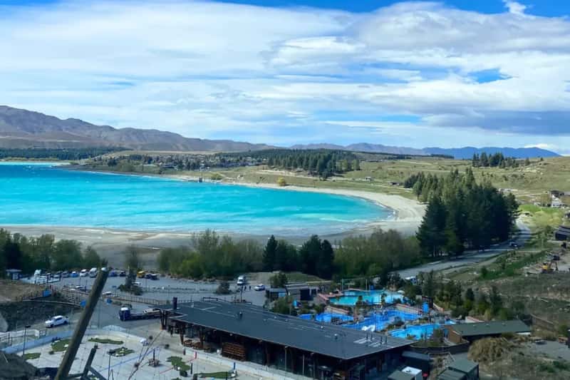 lake tekapo seen from the trail and the hot pools