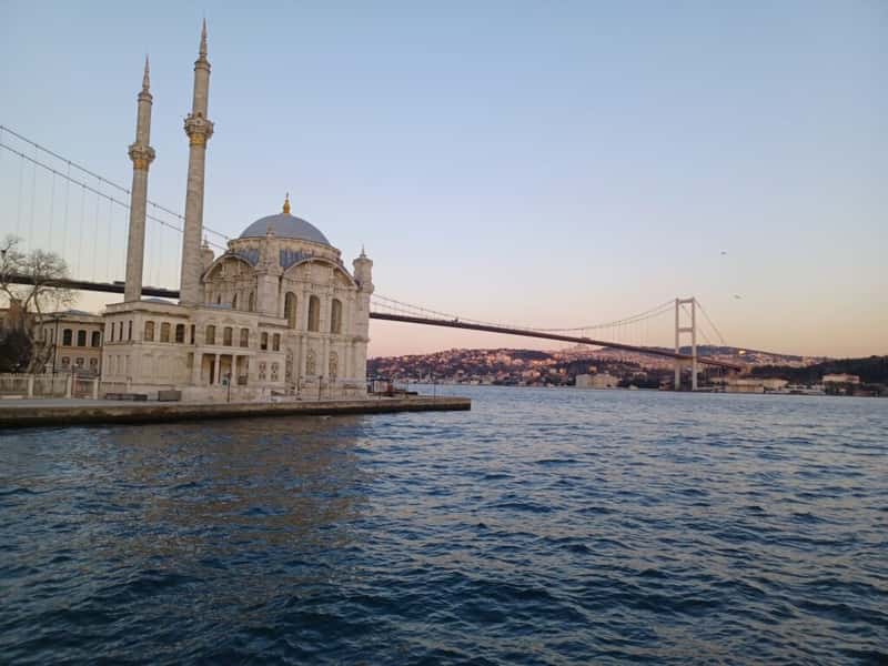 buyuk mecidiye mosque under the bosporus bridge in ortakoy istanbul turkiye