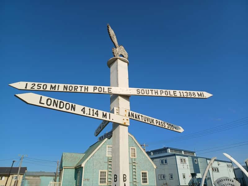 a signpost in Utqiagvik alaska the top of the world in the united states