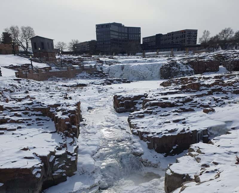 sioux falls waterfalls south dakota frozen and covered in snow in winter