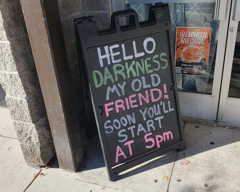 a chalkboard sign outside the dehn bar in salem oregon usa