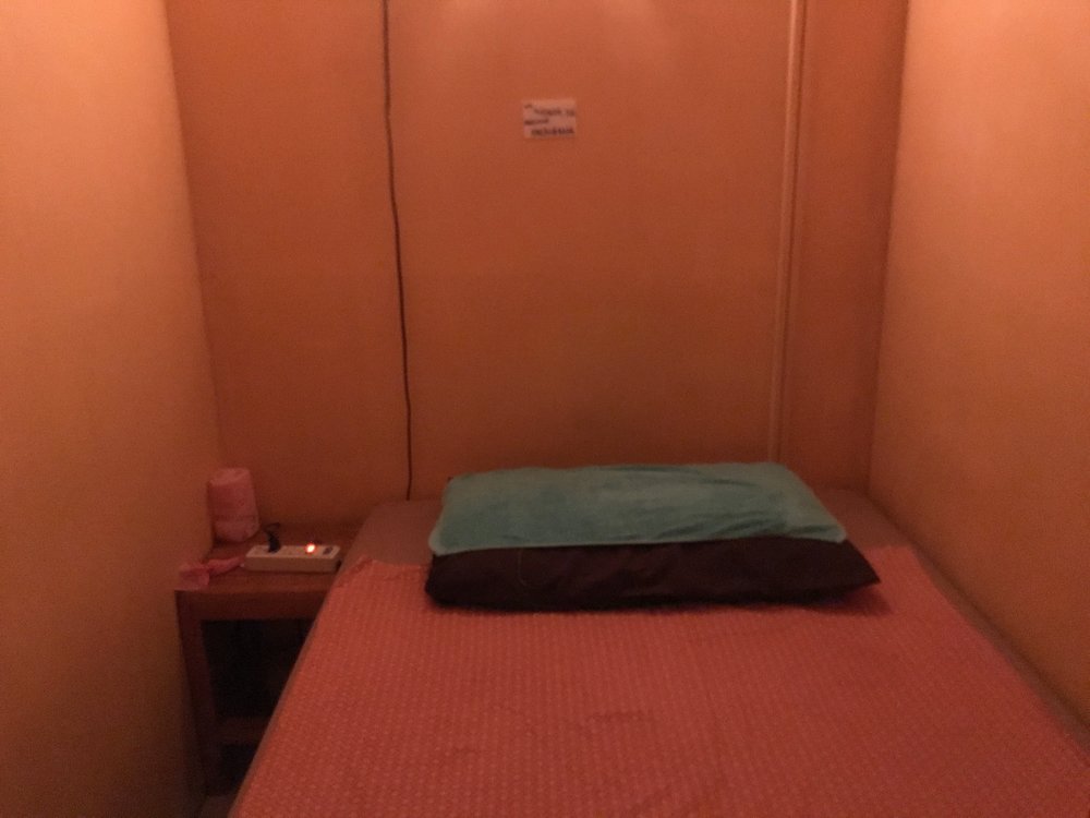 A typical treatment room in a Thai massage place off the street. It ain't the Four Seasons but for $8 a massage, it's worth it.