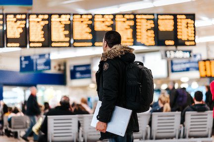 The future of green travel, a traveler walks through an airport, which may carry greener, biofueled flights in the future. 