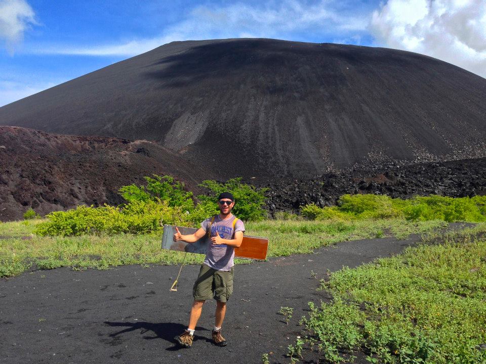 Volcano boarding in Leon, Nicaragua, standing in front of Cerro Negro